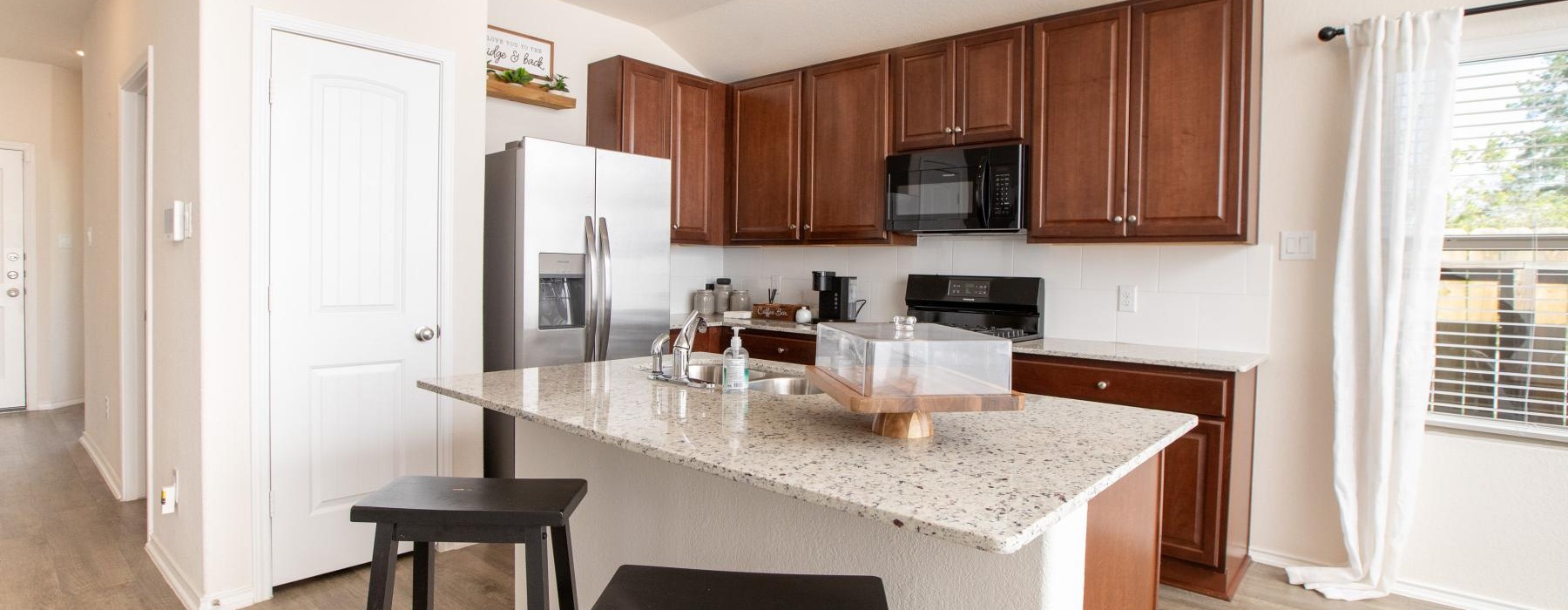 Well-lit kitchen with ample counter space