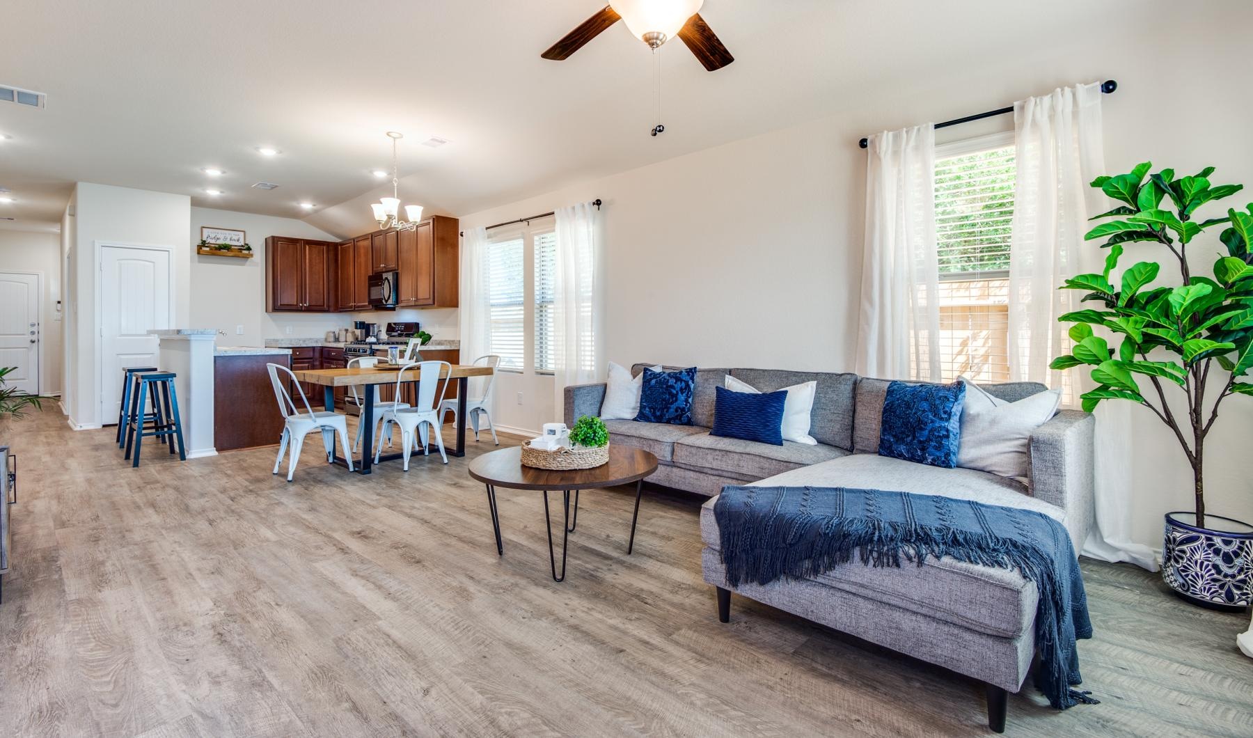 a living room with a couch and a table