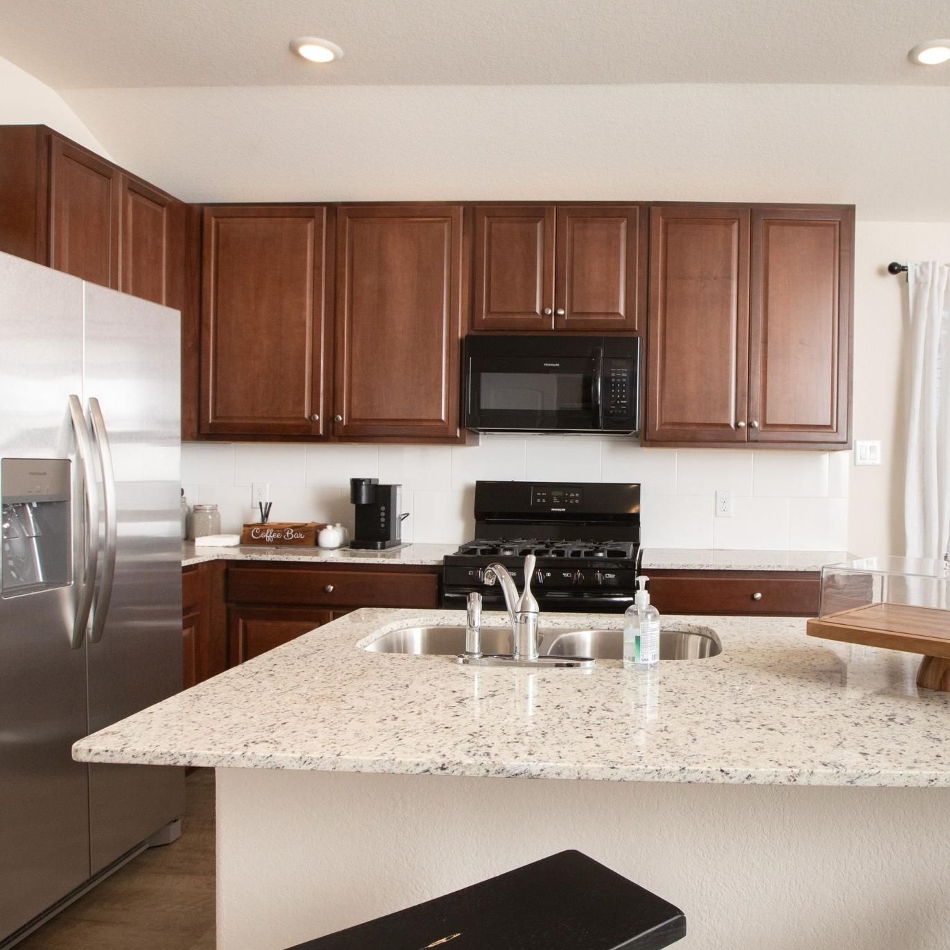 Well-lit kitchen with ample counter space